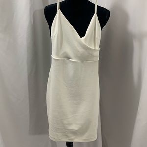 white dress with crosses in back